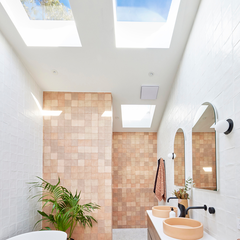 HG Bathroom Velux lights with salmon tiles