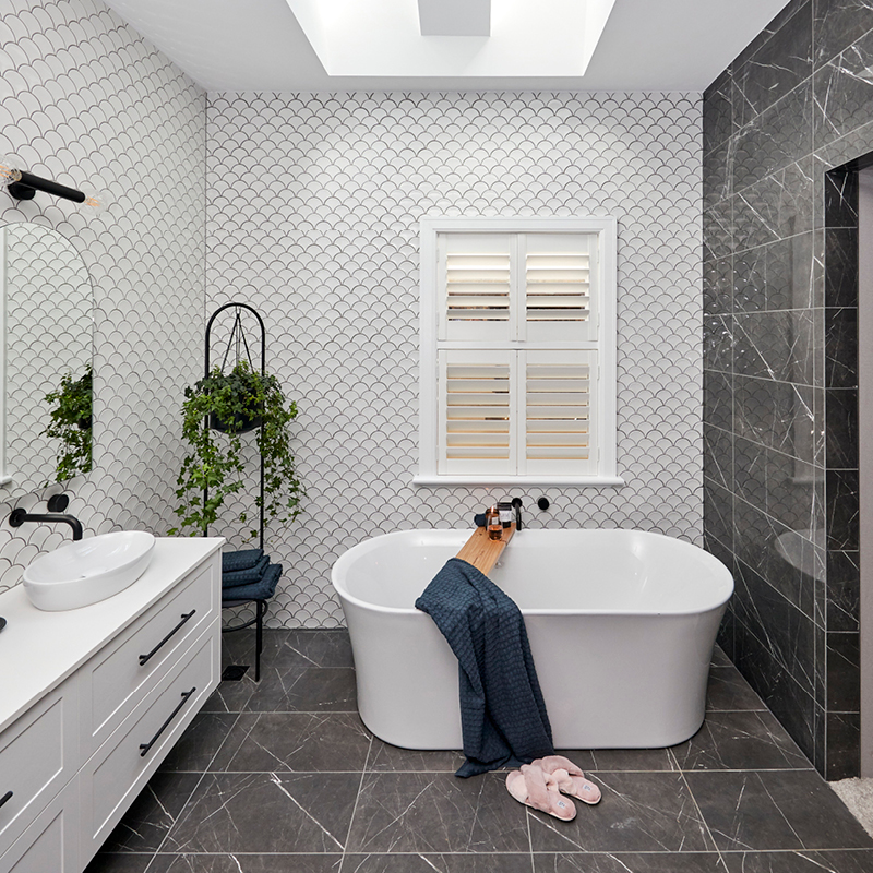 HG Bathroom marble floor with fishscale walls 